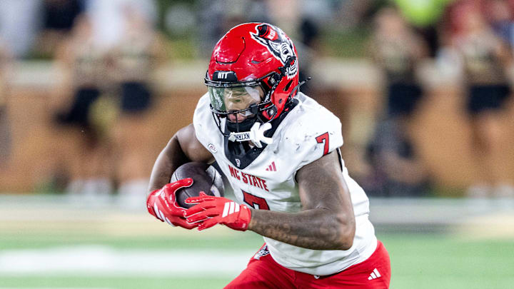 Sep 11, 2025; Winston-Salem, North Carolina, USA;  North Carolina State Wolfpack tight end Justin Joly (7) catches a pass against the Wake Forest Demon Deacons in second half at Allegacy Federal Credit Union Stadium. Mandatory Credit: Luke Jamroz-Imagn Images