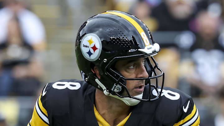 Pittsburgh Steelers quarterback Aaron Rodgers looks to complete a pass during the first quarter at Acrisure Stadium.