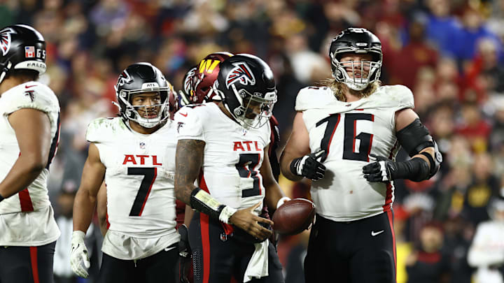 Kaleb McGary will be protecting Michael Penix Jr's blindside for a few more years - Atlanta Falcons v Washington Commanders