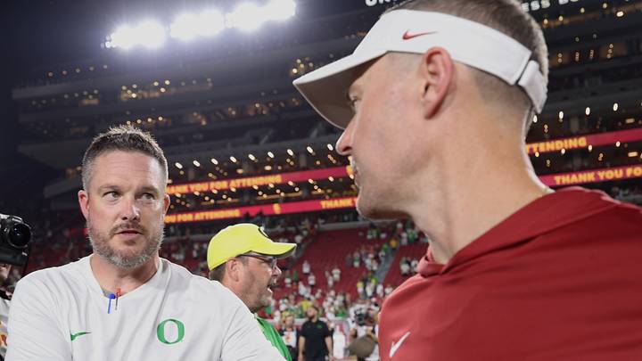 Sep 26, 2026; Los Angeles, California, USA; Oregon Ducks head coach Dan Lanning (left) shakes hands with USC Trojans head coach Lincoln Riley after the game at United Airlines Field at Los Angeles Memorial Coliseum. Mandatory Credit: Kiyoshi Mio-Imagn Images Sep 26, 2026; Los Angeles, California, USA; Oregon Ducks head coach Dan Lanning (left) shakes hands with USC Trojans head coach Lincoln Riley after the game at United Airlines Field at Los Angeles Memorial Coliseum. Mandatory Credit: Kiyoshi Mio-Imagn Images