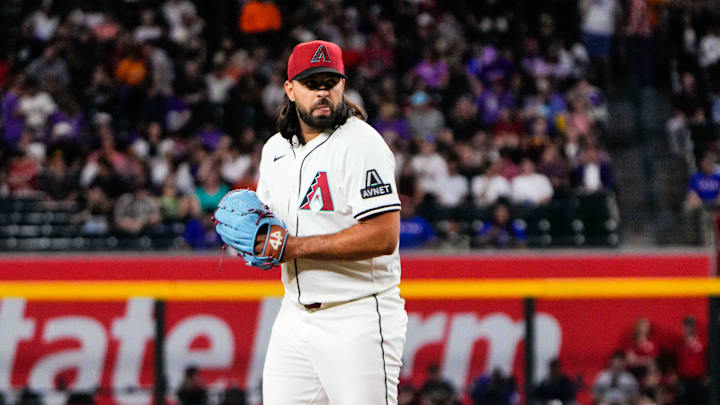 Sep 2, 2025; Phoenix, Arizona, USA; Arizona Diamondbacks pitcher Nabil Crismatt (61) pitches in the first inning of the game between Arizona Diamondbacks and Texas Rangers at Chase Field. Mandatory Credit: Arianna Grainey-Imagn Images