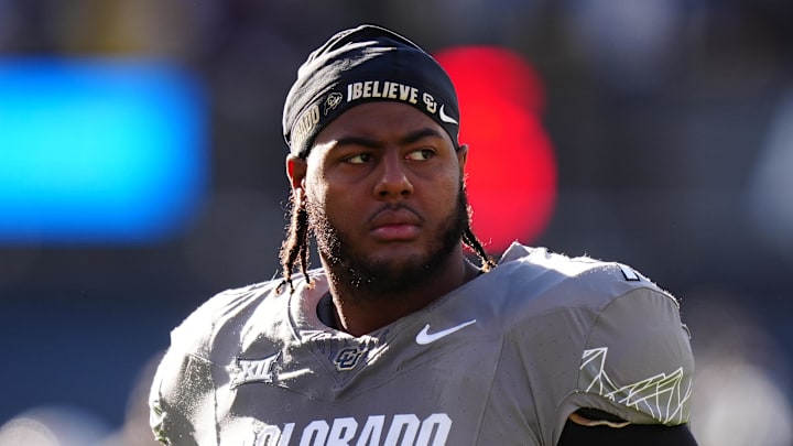 Nov 16, 2024; Boulder, Colorado, USA; Colorado Buffaloes offensive tackle Jordan Seaton (77) looks on before the game against the Utah Utes at Folsom Field.