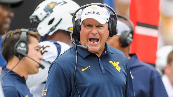 Sep 5, 2026; Morgantown, West Virginia, USA;  West Virginia Mountaineers head coach Rich Rodriguez yells at an official during the third quarter against the Coastal Carolina Chanticleers at Milan Puskar Stadium.  Mandatory Credit: Ben Queen-Imagn Images