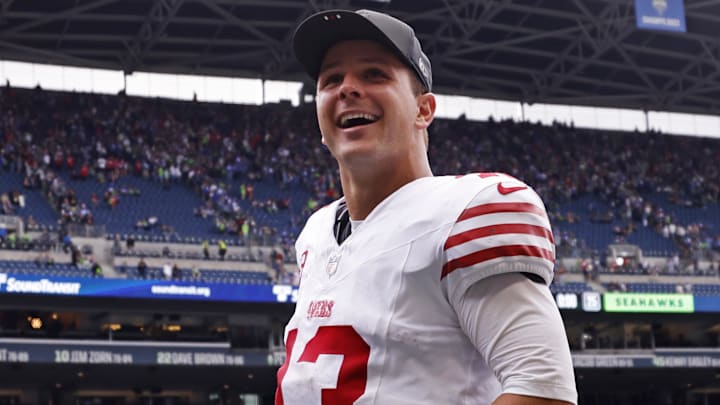 San Francisco 49ers quarterback Brock Purdy (13) reacts after the game against the Seattle Seahawks during the fourth quarter at Lumen Field.
