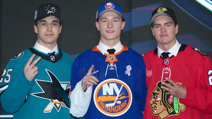 Jun 27, 2025; Los Angeles, California, USA; From left, Michael Misa, Matthew Schaefer and Anton Frondell pose for a photo after being drafted second, first and third in the first round of the 2025 NHL Draft at Peacock Theater. Mandatory Credit: Kirby Lee-Imagn Images