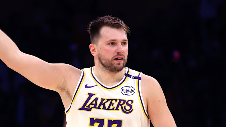 Mar 2, 2025; Los Angeles, California, USA; Los Angeles Lakers guard Luka Doncic (77) reacts to a play during the third quarter against the LA Clippers at Crypto.com Arena. Mandatory Credit: Jason Parkhurst-Imagn Images
