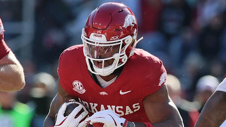 Arkansas Razorbacks running back Mike Washington Jr. rushes during the first quarter against Mississippi State.