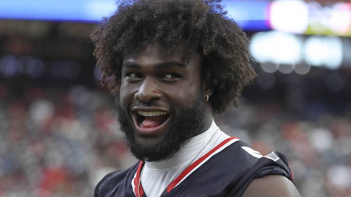 Houston Texans defensive end Will Anderson Jr. laughs