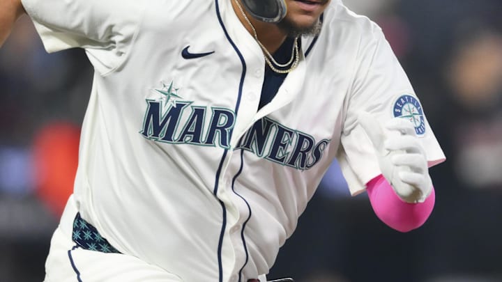 Oct 10, 2025; Seattle, Washington, USA; Seattle Mariners first baseman Josh Naylor (12) runs on a double against the Detroit Tigers during the second inning during game five of the ALDS round for the 2025 MLB playoffs at T-Mobile Park. Mandatory Credit: Steven Bisig-Imagn Images Oct 10, 2025; Seattle, Washington, USA; Seattle Mariners first baseman Josh Naylor (12) runs on a double against the Detroit Tigers during the second inning during game five of the ALDS round for the 2025 MLB playoffs at T-Mobile Park. Mandatory Credit: Steven Bisig-Imagn Images
