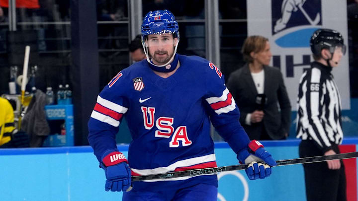 Feb 18, 2026; Milan, Italy; Dylan Larkin of United States celebrates scoring their first goal against Sweden in a men's ice hockey quarterfinal during the Milano Cortina 2026 Olympic Winter Games at Milano Santagiulia Ice Hockey Arena. Mandatory Credit: Amber Searls-Imagn Images Feb 18, 2026; Milan, Italy; Dylan Larkin of United States celebrates scoring their first goal against Sweden in a men's ice hockey quarterfinal during the Milano Cortina 2026 Olympic Winter Games at Milano Santagiulia Ice Hockey Arena. Mandatory Credit: Amber Searls-Imagn Images