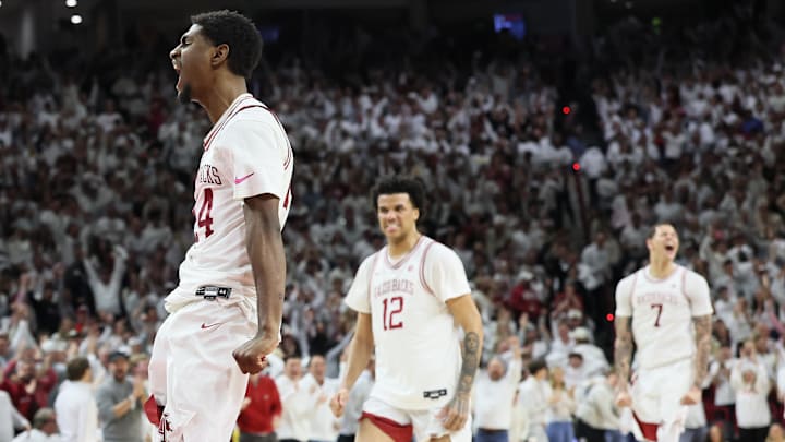 Arkansas wing Billy Richmond III (24) reacts after dunking the ball during the second half against the Kentucky Wildcats at Bud Walton Arena. Kentucky won 85-77. Arkansas wing Billy Richmond III (24) reacts after dunking the ball during the second half against the Kentucky Wildcats at Bud Walton Arena. Kentucky won 85-77.