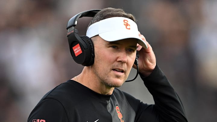 Sep 13, 2025; West Lafayette, Indiana, USA; Southern California Trojans head coach Lincoln Riley stands on the sidelines during the first quarter against the Purdue Boilermakers at Ross-Ade Stadium. Mandatory Credit: Marc Lebryk-Imagn Images