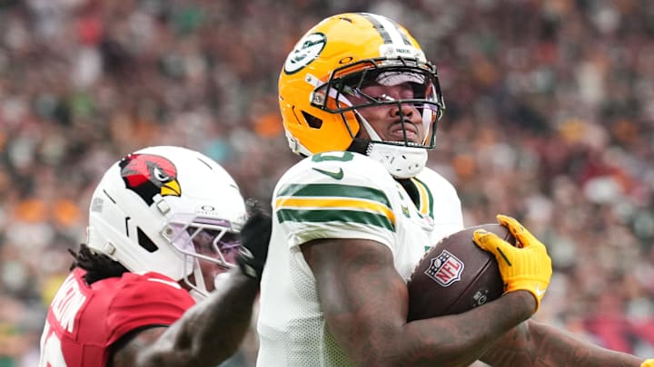 Green Bay Packers running back Josh Jacobs (8) runs for a touchdown against the Arizona Cardinals. Green Bay Packers running back Josh Jacobs (8) runs for a touchdown against the Arizona Cardinals.