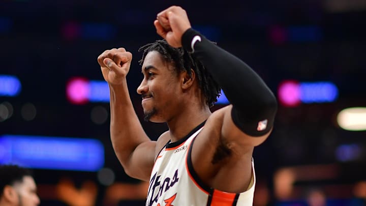Dec 23, 2024; Los Angeles, California, USA; Detroit Pistons guard Jaden Ivey (23) celebrates the victory against the Los Angeles Lakers at Crypto.com Arena. Mandatory Credit: Gary A. Vasquez-Imagn Images
