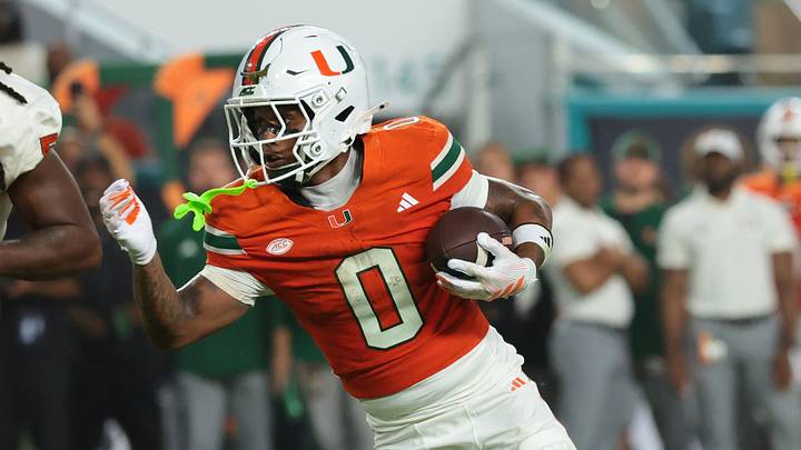 Sep 10, 2026; Miami Gardens, Florida, USA;  Miami Hurricanes running back Girard Pringle Jr. (0) runs with the ball for a touchdown in the second quarter against the Florida A&M Rattlers at Hard Rock Stadium.  Mandatory Credit: Sam Navarro-Imagn Images