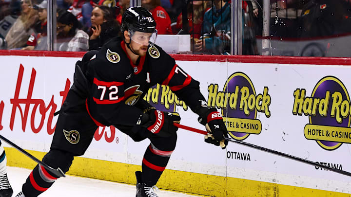 Mar 15, 2026; Ottawa, Ontario, CAN; San Jose Sharks center Macklin Celebrini (71) vies for the puck with Ottawa Senators defenseman Thomas Chabot (72) during the second period at Canadian Tire Centre. Mandatory Credit: Keito Newman-Imagn Images