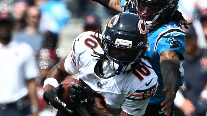 Sep 13, 2026; Charlotte, North Carolina, USA; Chicago Bears wide receiver Luther Burden III (10) runs the ball while defended by Carolina Panthers cornerback Will Lee III (24) in the second quarter at Bank of America Stadium. Mandatory Credit: Bob Donnan-Imagn Images Sep 13, 2026; Charlotte, North Carolina, USA; Chicago Bears wide receiver Luther Burden III (10) runs the ball while defended by Carolina Panthers cornerback Will Lee III (24) in the second quarter at Bank of America Stadium. Mandatory Credit: Bob Donnan-Imagn Images
