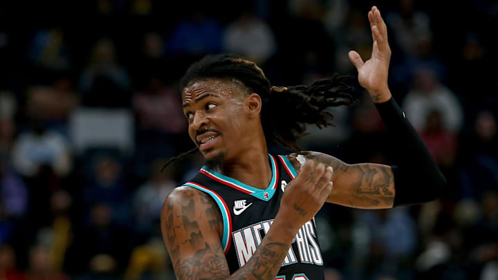 Nov 9, 2025; Memphis, Tennessee, USA; Memphis Grizzlies guard Ja Morant (12) reacts toward an official during the first quarter against the Oklahoma City Thunder at FedExForum. Mandatory Credit: Petre Thomas-Imagn Images