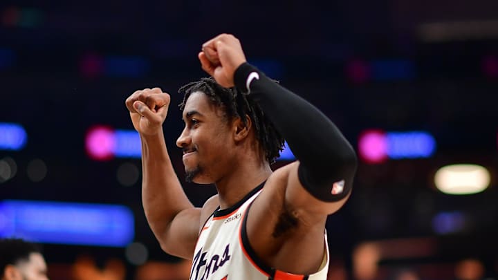 Dec 23, 2024; Los Angeles, California, USA; Detroit Pistons guard Jaden Ivey (23) celebrates the victory against the Los Angeles Lakers at Crypto.com Arena. Mandatory Credit: Gary A. Vasquez-Imagn Images