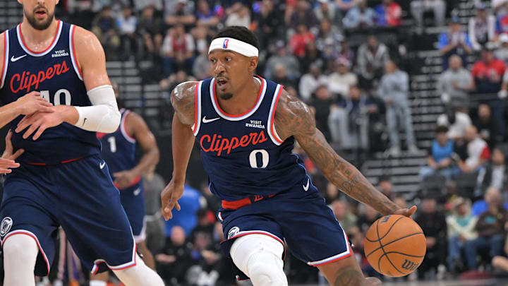 Oct 24, 2025; Inglewood, California, USA; Phoenix Suns forward Oso Ighodaro (11) guards Los Angeles Clippers guard Bradley Beal (0) as he drives to the basket in the first half at Intuit Dome. Mandatory Credit: Jayne Kamin-Oncea-Imagn Images Oct 24, 2025; Inglewood, California, USA; Phoenix Suns forward Oso Ighodaro (11) guards Los Angeles Clippers guard Bradley Beal (0) as he drives to the basket in the first half at Intuit Dome. Mandatory Credit: Jayne Kamin-Oncea-Imagn Images