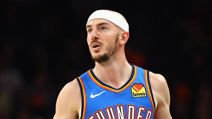 Apr 27, 2026; Phoenix, Arizona, USA; Oklahoma City Thunder guard Alex Caruso (9) against the Phoenix Suns during game four of the first round of the 2026 NBA Playoffs at Mortgage Matchup Center. Mandatory Credit: Mark J. Rebilas-Imagn Images