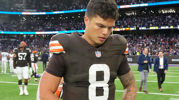 Oct 5, 2025; Tottenham, United Kingdom; Cleveland Browns quarterback Dillon Gabriel (8) walks off the field after their loss against the Minnesota Vikings in an NFL International Series game at Tottenham Hotspur Stadium. Mandatory Credit: Kirby Lee-Imagn Images