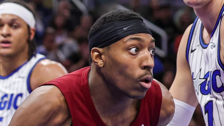 Cleveland Cavaliers forward Nae'qwan Tomlin drives around Orlando Magic forward Moritz Wagner.