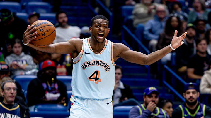 Feb 23, 2025; New Orleans, Louisiana, USA;  San Antonio Spurs guard De'Aaron Fox (4) reacts  to a play against the New Orleans Pelicans during the second half at Smoothie King Center.