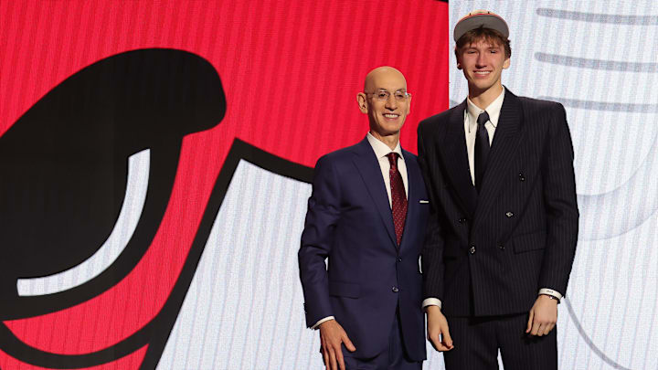 Jun 26, 2024; Brooklyn, NY, USA; Matas Buzelis poses for photos with NBA commissioner Adam Silver after being selected in the first round by the Chicago Bulls in the 2024 NBA Draft at Barclays Center. Mandatory Credit: Brad Penner-Imagn Images