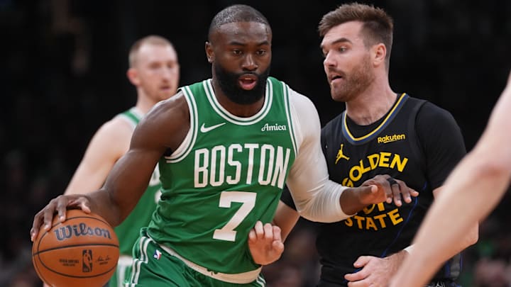 Mar 18, 2026; Boston, Massachusetts, USA; Boston Celtics guard Jaylen Brown (7) drivers the ball against Golden State Warriors guard Pat Spencer (61) in the first quarter at TD Garden. Mandatory Credit: David Butler II-Imagn Images