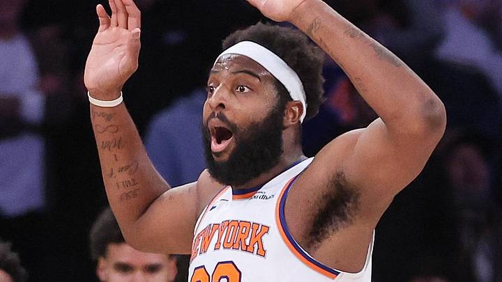 Feb 4, 2026; New York, New York, USA;  New York Knicks center Mitchell Robinson (23) reacts after getting called for a foul in the second overtime against the Denver Nuggets at Madison Square Garden. Mandatory Credit: Wendell Cruz-Imagn Images