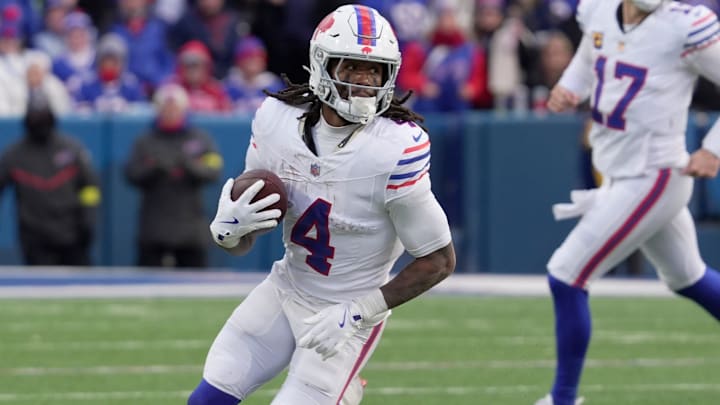 Buffalo Bills running back James Cook III runs with the ball after catching a short pass from quarterback Josh Allen. Buffalo Bills running back James Cook III runs with the ball after catching a short pass from quarterback Josh Allen.