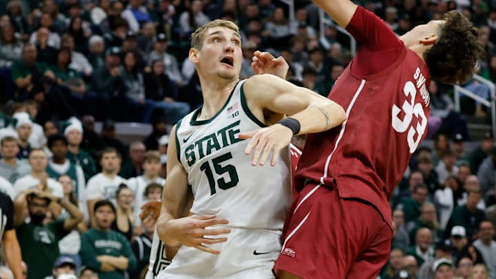 Michigan State center Carson Cooper battles for a rebound during a game against Colgate on Nov. 3, 2025.