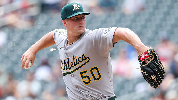 Aug 21, 2025; Minneapolis, Minnesota, USA; Athletics starting pitcher Jack Perkins (50) delivers a pitch against the Minnesota Twins during the first inning at Target Field. Mandatory Credit: Matt Krohn-Imagn Images