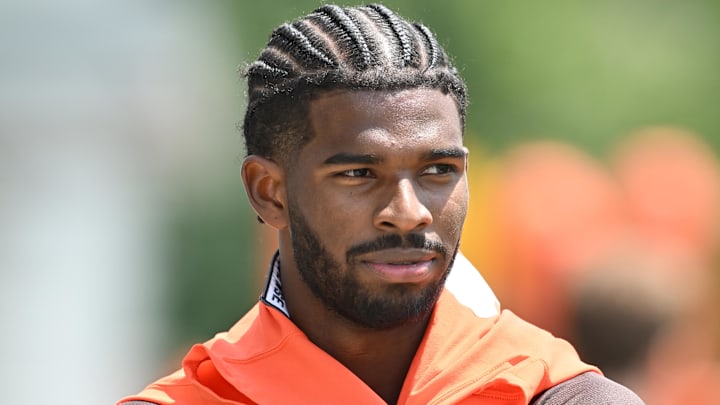 Jun 10, 2025; Berea, OH, USA; Cleveland Browns quarterback Shedeur Sanders (12) walks off the field during minicamp at CrossCountry Mortgage Campus. Mandatory Credit: Ken Blaze-Imagn Images