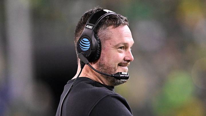 Dec 20, 2025; Eugene, OR, USA; Oregon Ducks head coach Dan Lanning smiles during the third quarter against the James Madison Dukes at Autzen Stadium. Mandatory Credit: Craig Strobeck-Imagn Images Dec 20, 2025; Eugene, OR, USA; Oregon Ducks head coach Dan Lanning smiles during the third quarter against the James Madison Dukes at Autzen Stadium. Mandatory Credit: Craig Strobeck-Imagn Images