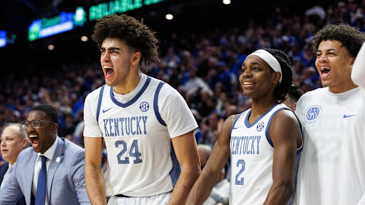 Feb 7, 2026; Lexington, Kentucky, USA; Kentucky Wildcats center Malachi Moreno (24), guard Jasper Johnson (2) and forward Braydon Hawthorne (right) celebrate from the bench during the second half against the Tennessee Volunteers at Rupp Arena at Central Bank Center. Mandatory Credit: Jordan Prather-Imagn Images