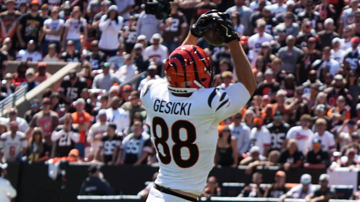 Bengals Mike Gesicki (88) leaps to catch the ball during their games against the Cleveland Browns at Huntington Bank Field on Sunday September 7, 2025. Bengals lead the game at halftime with a score of 14-10.
