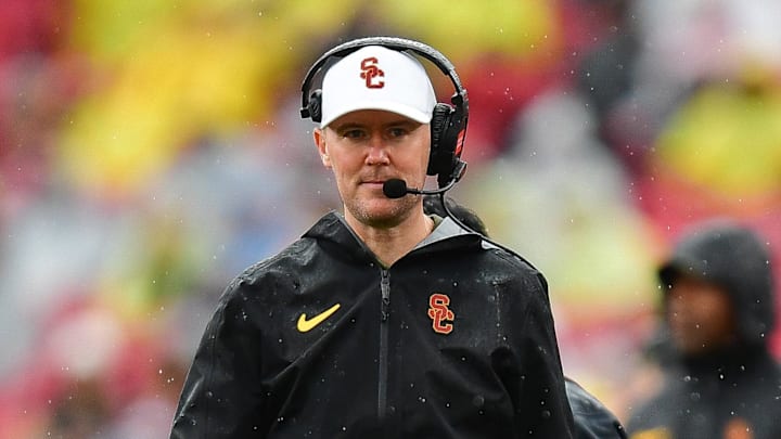 Nov 15, 2025; Los Angeles, California, USA; Southern California Trojans head coach Lincoln Riley watches game action against the Iowa Hawkeyes during the first half at the Los Angeles Memorial Coliseum. Mandatory Credit: Gary A. Vasquez-Imagn Images