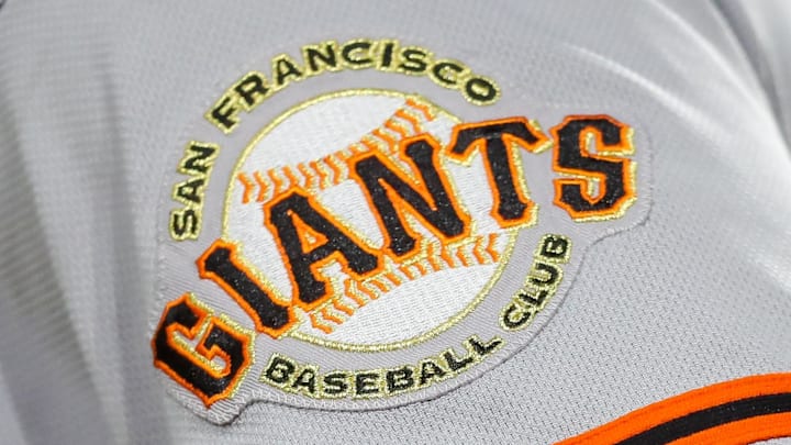 The San Francisco Giants logo on the sleeve of a player's jersey. The San Francisco Giants logo on the sleeve of a player's jersey.