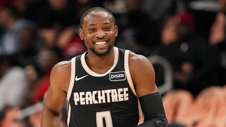 Feb 26, 2026; Atlanta, Georgia, USA; Atlanta Hawks forward Jonathan Kuminga (0) reacts after making a three point shot against the Washington Wizards during the first half at State Farm Arena. Mandatory Credit: Dale Zanine-Imagn Images