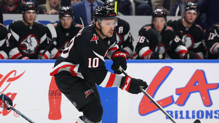 Mar 12, 2026; Buffalo, New York, USA; Buffalo Sabres center Sam Carrick (10) makes a pass as Washington Capitals center Justin Sourdif (34) defends during the second period at KeyBank Center. Mandatory Credit: Timothy T. Ludwig-Imagn Images Mar 12, 2026; Buffalo, New York, USA; Buffalo Sabres center Sam Carrick (10) makes a pass as Washington Capitals center Justin Sourdif (34) defends during the second period at KeyBank Center. Mandatory Credit: Timothy T. Ludwig-Imagn Images