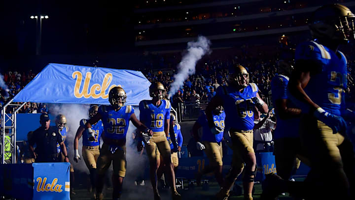 Aug 30, 2025; Pasadena, California, USA; UCLA Bruins are introduced before playing against the Utah Utes at Rose Bowl. Mandatory Credit: Gary A. Vasquez-Imagn Images