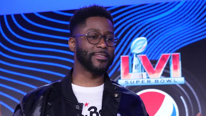 NFL moderator Nate Burleson at the Super Bowl LVI halftime show press conference at Los Angeles Convention Center