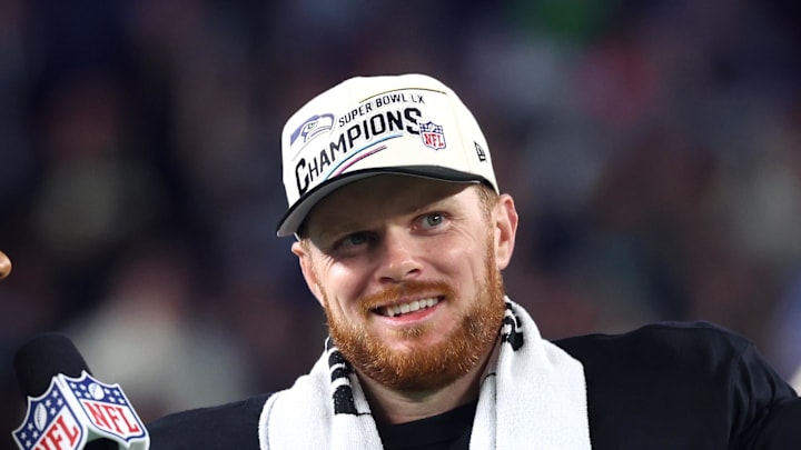 Seattle Seahawks quarterback Sam Darnold celebrates with the Vince Lombardi trophy.