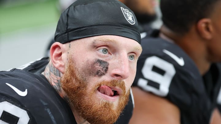 Las Vegas Raiders DE Maxx Crosby (98) looks on from the sideline during the first quarter against the Chicago Bears