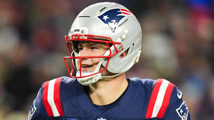 Jan 11, 2026; Foxborough, MA, USA; New England Patriots quarterback Drake Maye (10) smiles after a touchdown pass during the fourth quarter against the Los Angeles Chargers in an AFC Wild Card Round game at Gillette Stadium. Mandatory Credit: David Butler II-Imagn Images