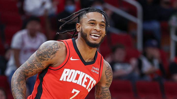 Jan 1, 2024; Houston, Texas, USA; Houston Rockets forward Cam Whitmore (7) smiles after a play during the game against the Detroit Pistons at Toyota Center. Mandatory Credit: Troy Taormina-USA TODAY Sports