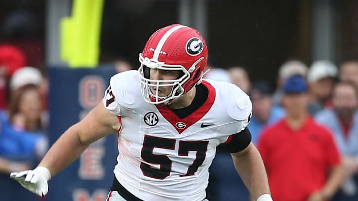 Nov 9, 2024; Oxford, Mississippi, USA; Georgia Bulldogs offensive lineman Monroe Freeling (57) blocks Mississippi Rebels defensive lineman Princely Umanmielen (1) during the first half at Vaught-Hemingway Stadium. Mandatory Credit: Petre Thomas-Imagn Images