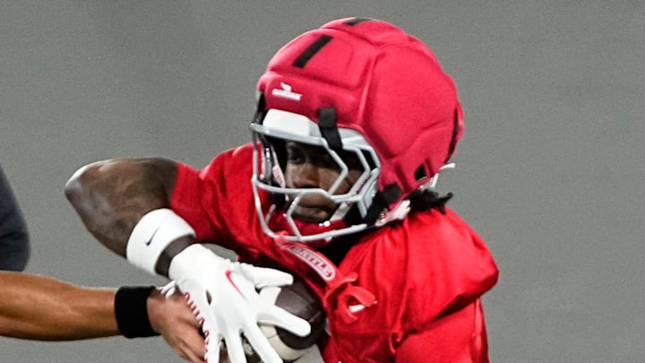 Ohio State Buckeyes quarterback Tavien St. Clair (9) hands off to running back Legend Bey (2) during the first day of spring workouts for the 2026 football season at Woody Hayes Athletic Complex in Columbus on March 10, 2026.